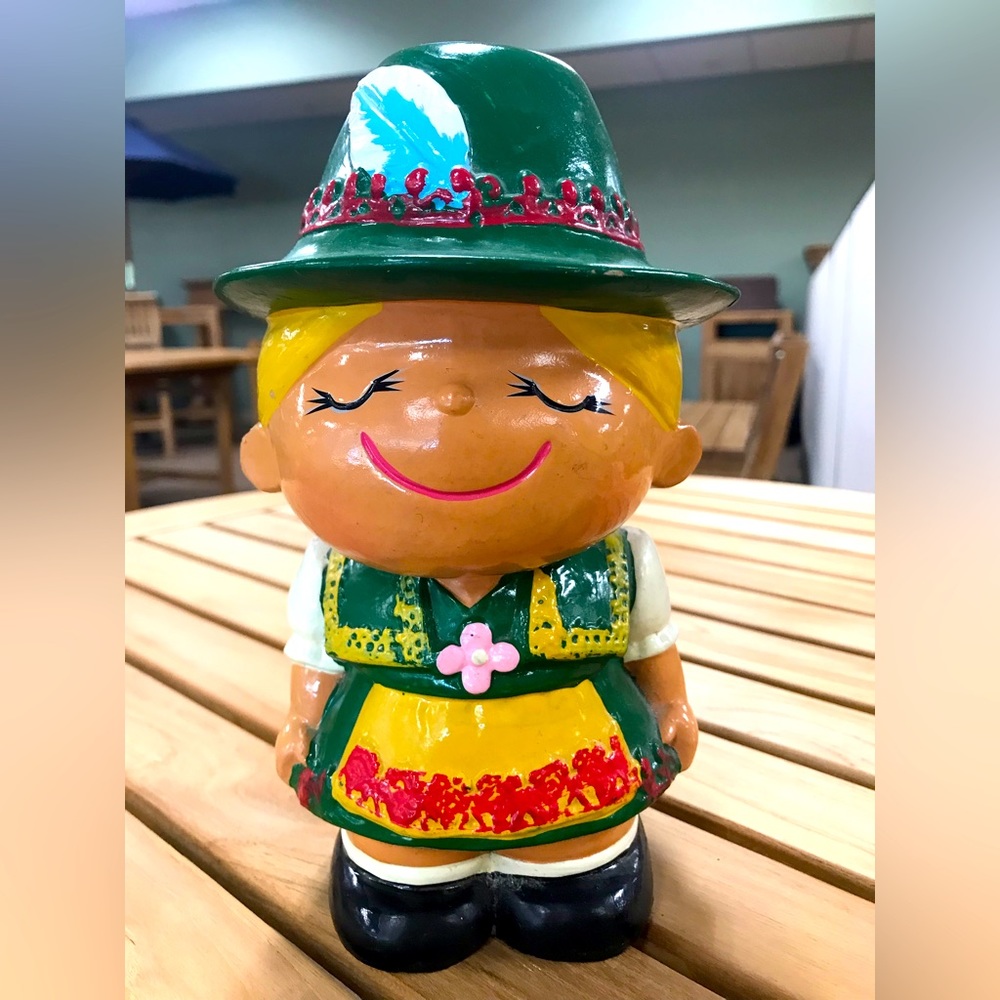 Vintage 1960s piggy bank.  Sweet alpine girl